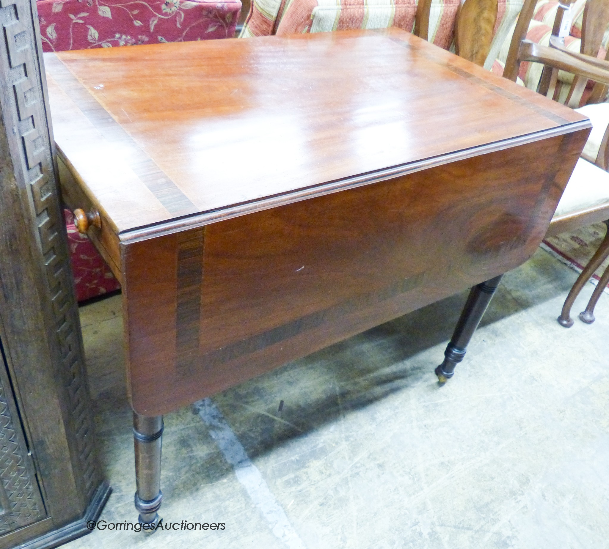 A Regency rosewood banded mahogany Pembroke table, width 88cm, depth 53cm, height 72cm